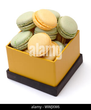 Colorful Macaron in paper box on white background Stock Photo