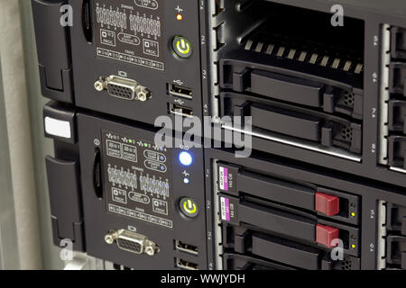 servers stack with hard drives in a datacenter for backup and data storage Stock Photo