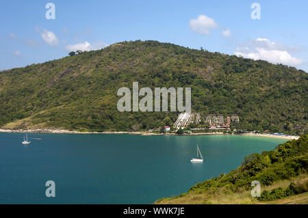 Secluded bay at Nai Harn Beach with the Royal Phuket Yacht Club Luxury Hotel in the south of the island of Phuket
