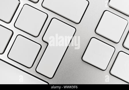 Blank buttons on modern aluminum keyboard. Stock Photo