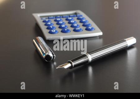 pen showing communication contact us or mail concept on black background Stock Photo