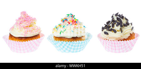 three cupcakes with butter cream decorated sprinkles isolated on white background, panorama Stock Photo