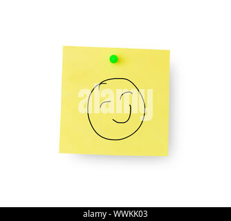 Smiley face on sticky memo notes on white background Stock Photo