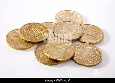 Bunch of metal Ukrainian coins isolated on white Stock Photo