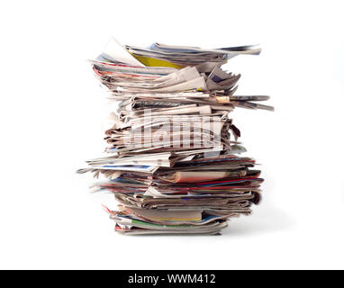 Stack of newspapers isolated on white background Stock Photo