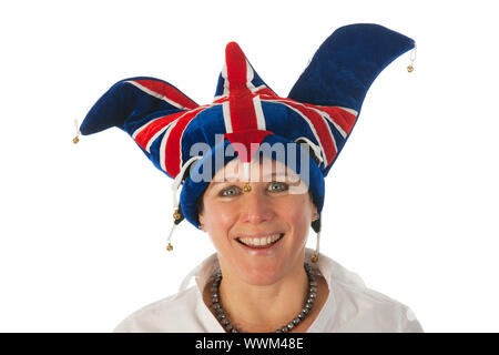 Woman is wearing a funny Brittish hat Stock Photo