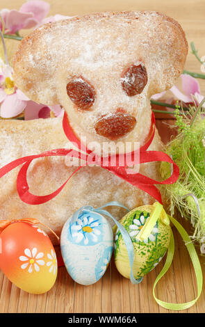 Easter lamb with painted eggs Stock Photo
