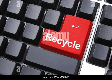 environmental protection with recycle button on keyboard Stock Photo