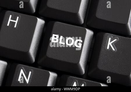 internet blog concept with button on computer keyboard Stock Photo