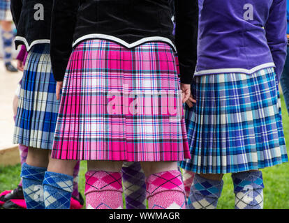 Young highland dancing girls wearing colourful tartan kilts at the Peebles highland games. Peebles, Scottish borders, Scotland Stock Photo
