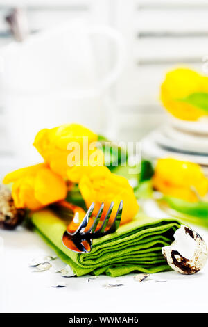 spring table settings with fresh tulips - easter concept Stock Photo