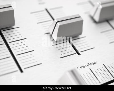 Detail of the controls of an audio mixing device Stock Photo