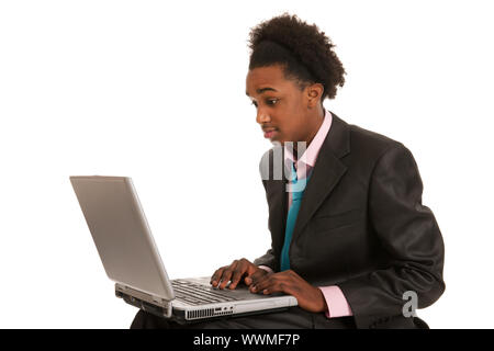 Young black business man surprised by the laptop Stock Photo