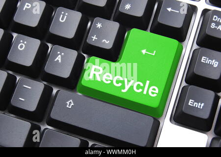 environmental protection with recycle button on keyboard Stock Photo