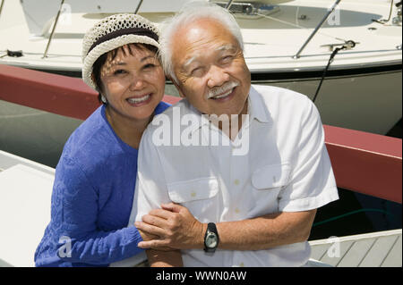 Couple Together in Marina Stock Photo