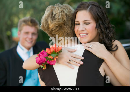 Friends Hugging at Prom Stock Photo