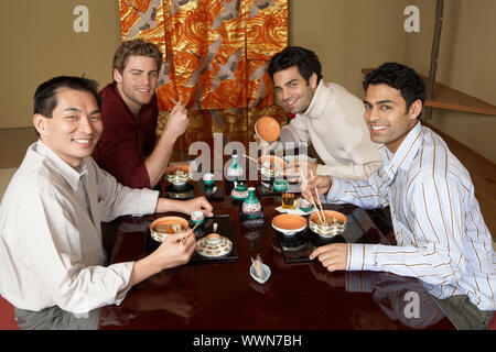 Friends Dining Out Together Stock Photo