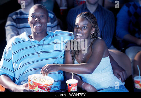 Couple Watching Movie Together Stock Photo