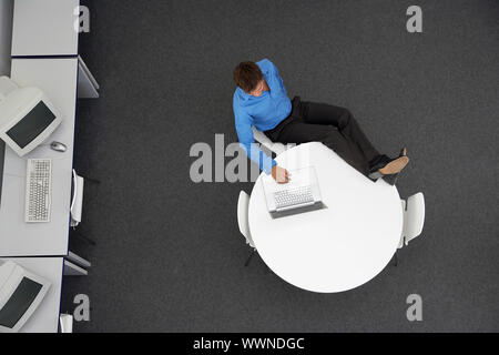 Man Using Laptop in Computer Lab Stock Photo