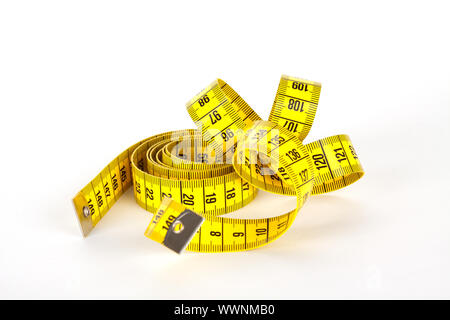 yellow measure tape with scale in centimeters Stock Photo
