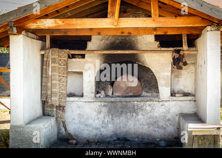 Outside village wood oven isolated Stock Photo