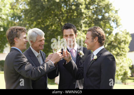 Groom with Groomsmen and Father Stock Photo
