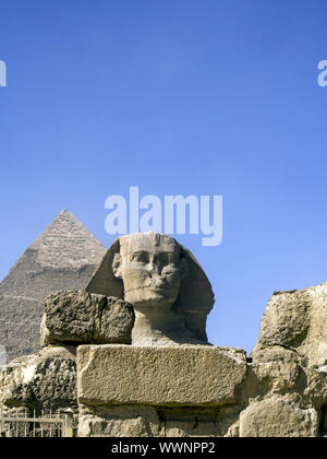 Sphinx against the Pyramid of Khafre Stock Photo