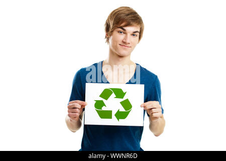 Casual young man holding a recycling sign to promote a green and better world, isolated on white background Stock Photo