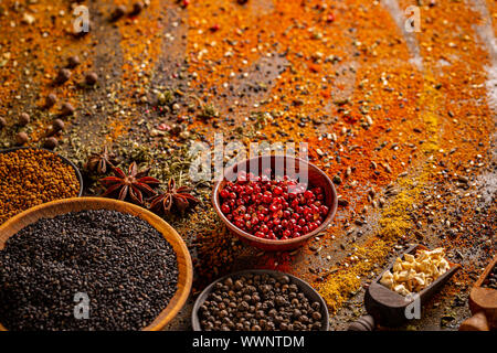 Set of condiments on spices texture background Stock Photo