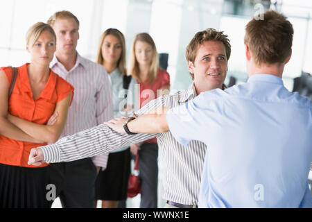 Passengers going through airport security check Stock Photo