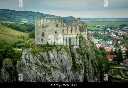 Aerial view of medieval Beckov castle with inner and outer courtyard, cannon tower,  castle gate, chapel in Slovakia Stock Photo