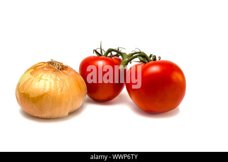 Two vine tomatoes and an onion isolated on white background. Selective focus. Stock Photo