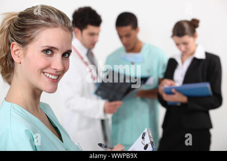 A team of doctors conferring Stock Photo