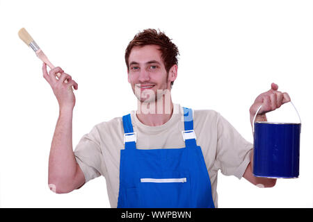 Painter with a pot of blue paint Stock Photo