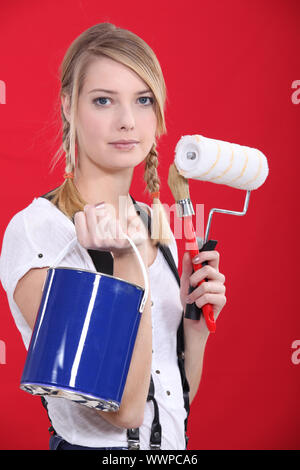 Painter holding her supplies Stock Photo