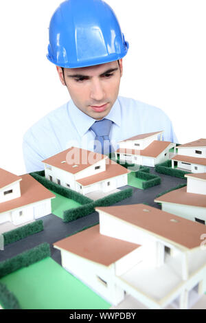 Entrepreneur looking at a model Stock Photo