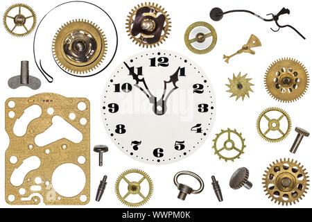 Spare parts for clock. Metal gears, cogwheels, clock face and other details Stock Photo
