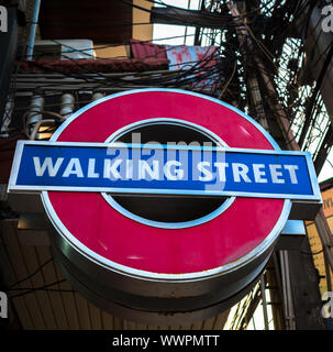 Walking street sign, Pattaya, popular tourist attraction in Thailand Stock Photo