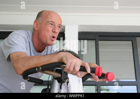 Elderly man working out Stock Photo