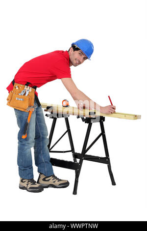 Carpenter marking strips Stock Photo