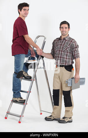 Two artisan workers Stock Photo