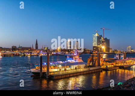 Hamburg skyline at the Elbe river at night. Night photo of the City from the harbor side Stock Photo