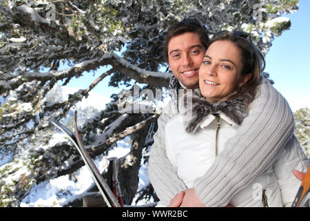 Portrait of young couple in the mountain Stock Photo
