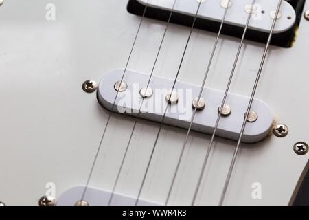 Close up of electric guitar element. Abstract photo. Stock Photo