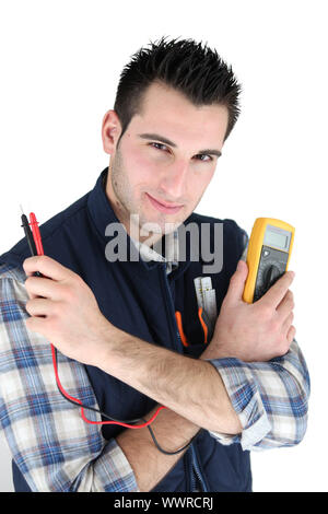 Man reading multimeter Stock Photo - Alamy