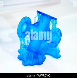 Objects photopolymer printed on a 3d printer. Blue Object. Stereolithography 3D printer, technology of liquid photopolymerization under UV light Stock Photo