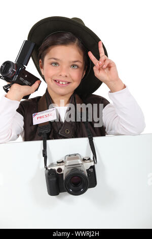 little girl dressed as a adventure reporter Stock Photo