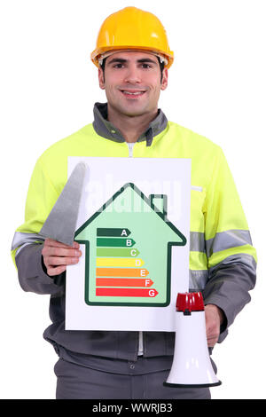 Builder with an energy efficient sign Stock Photo