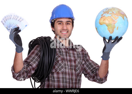 Tradesman getting rich from working abroad Stock Photo