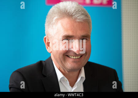Duesseldorf, Germany. 16th Sep, 2019. Andreas Pinkwart (l), NRW Minister of Economic Affairs, looks into the round during a press conference of the FDP NRW. The FDP has commented on its work in the state government. Credit: Marius Becker/dpa/Alamy Live News Stock Photo
